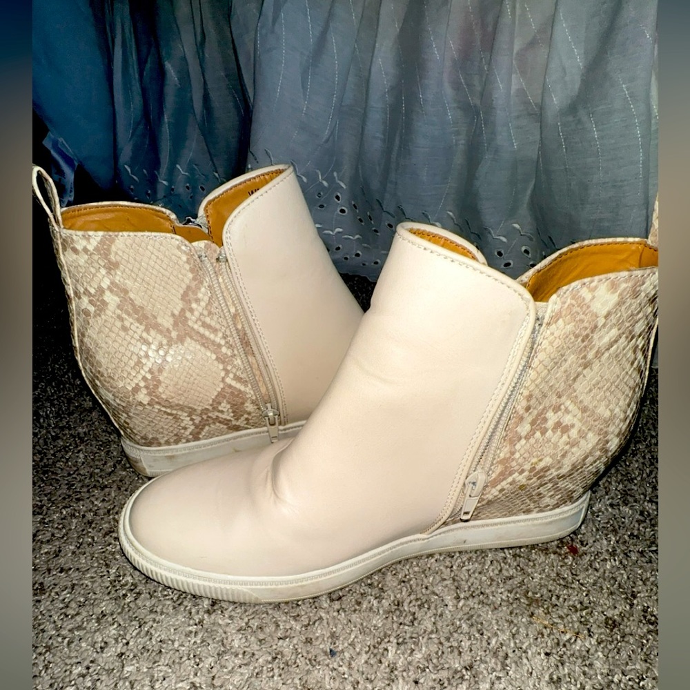 Cream and snakeskin high top shoes